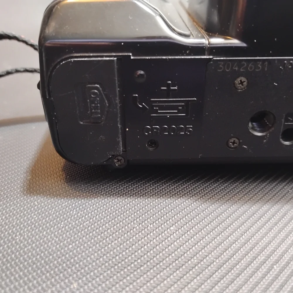 Nikon Black Camera with Gold Detail